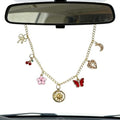 Car Rearview Mirror Charm Sun Moon Butterfly Gold Hanging Ornament by Unknown