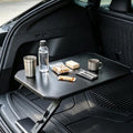 Foldable trunk table designed to fit in the trunks of most sedans and SUV by YIMAKEYLIGHTFIXTURE